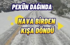 Dolu yağışı Pekün Dağını beyaza bürüdü