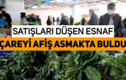 Ispanak satışları düşen esnaf çareyi afiş asmakta buldu